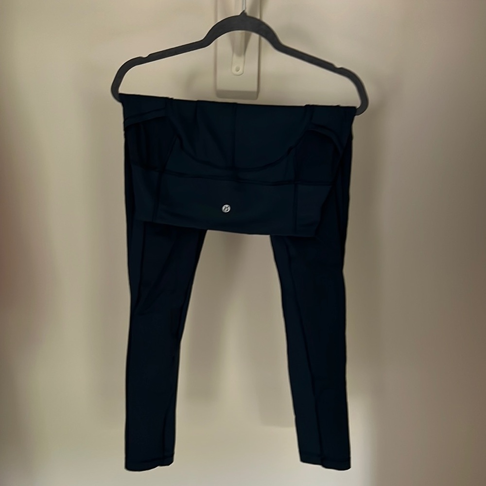 Navy blue lulu lemon leggings. Navy blue. Side pocket. Size L.